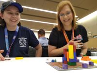 4798976 LOTS: A Competitive Tower Building Game